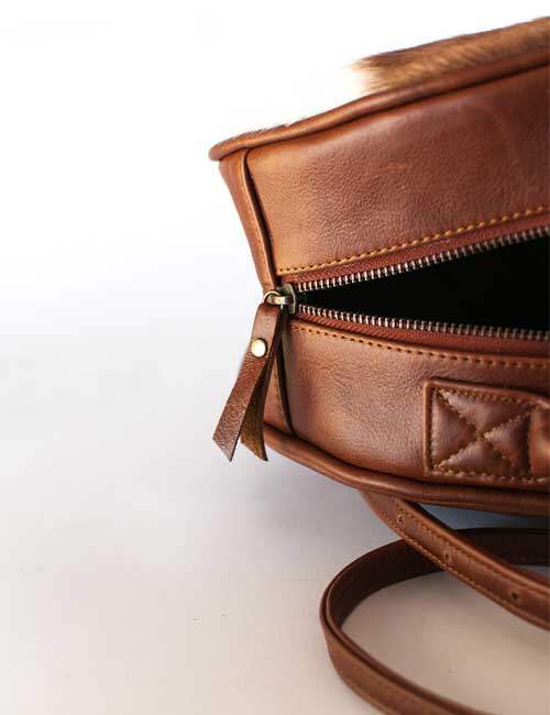 grace-round-springbok-leather-mini-backpack